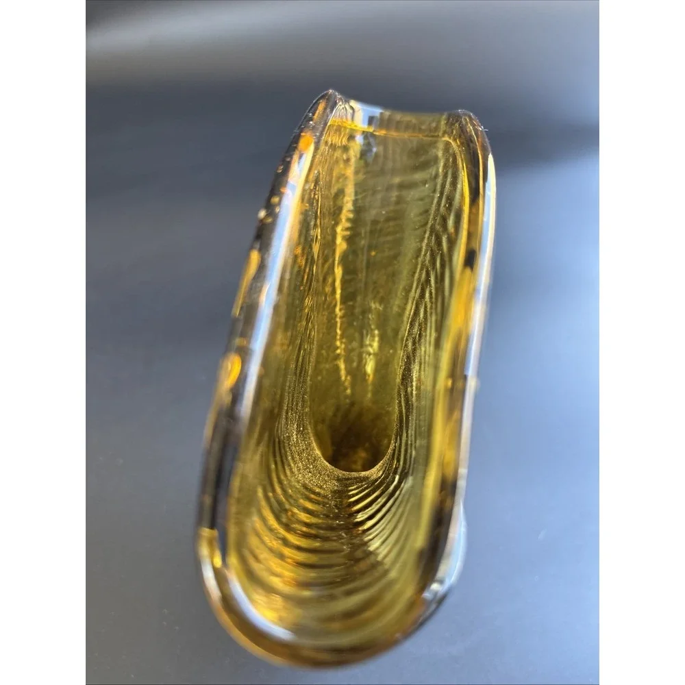 Mid-Century Modern Amber Glass Fan Vase featuring an optic ribbed pattern.